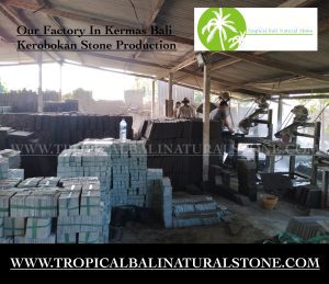 "Factory of Bali Kerobokan stone manufacturing facility with skilled artisans at work."